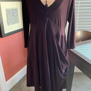 Asymmetrical dress with drapey pocket